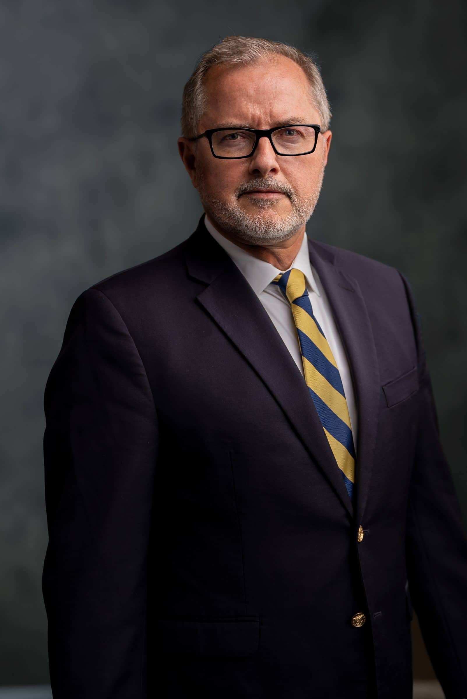 Headshot of Dean of the Honors College and an Associate Professor of English, Kevin Gustafson.