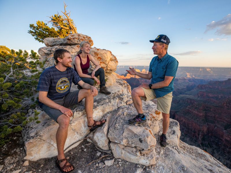 Students talk with professor at the rim of the Grand Canyon National Park.