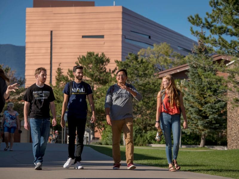 Transfer students walking at Flagstaff mountain campus.