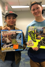 students holding vision board