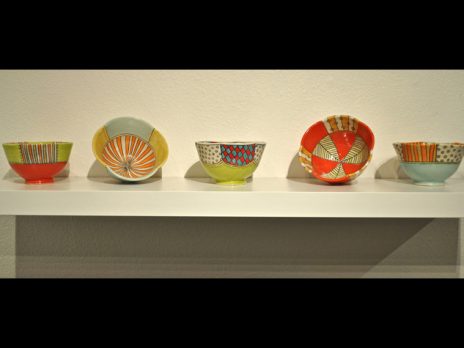 Assorted colorful ceramic bowls by student Eric Gooch