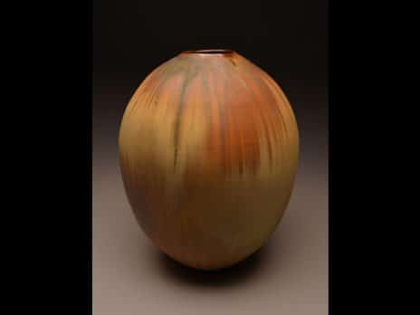 Ovoid orange and yellow vase by student Duncan Tweed
