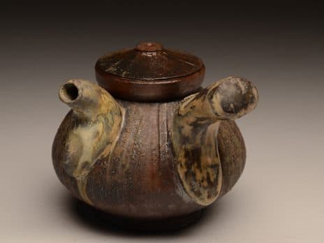 Brown clay teapot sculpted by Professor Jason Hess