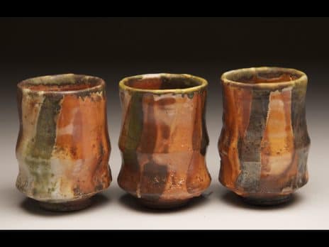 A set of three ceramic cups sculpted by Professor Jason Hess