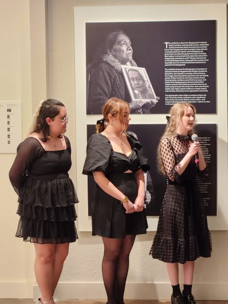 Three students talk about the exhibit Disappeared: Portraits of Absence. 