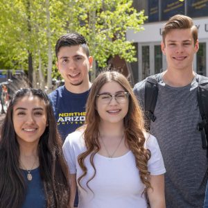 NAU students posing at a campus.