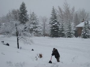 photo of man out in snow