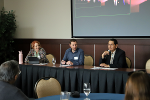 A discussion panel featuring speakers Dawn Gilpin (ASU), Matt Maurer (NAU), and Jonathan Nez (Navajo Nation).