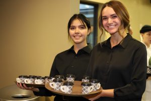 NAU Hotel and Restaurant Management students get ready to deliver food at the October 27 ABRC workshop.