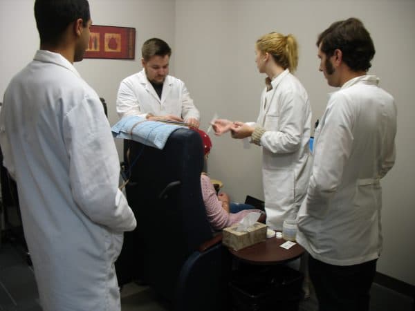 Students in lab conducting EEG study