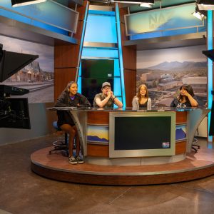 Four students broadcasting together.