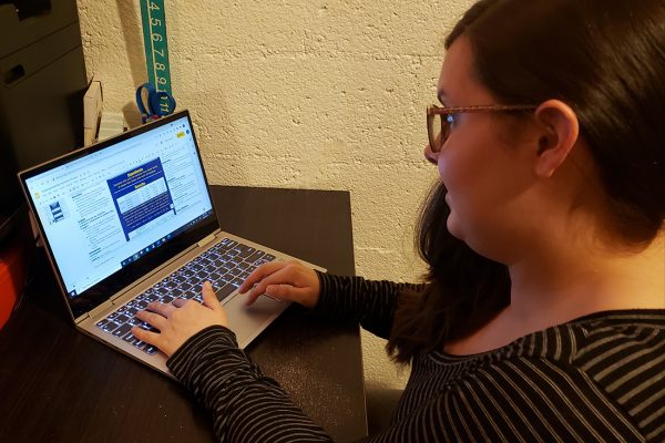 Hannah Bechtel typing on a computer.