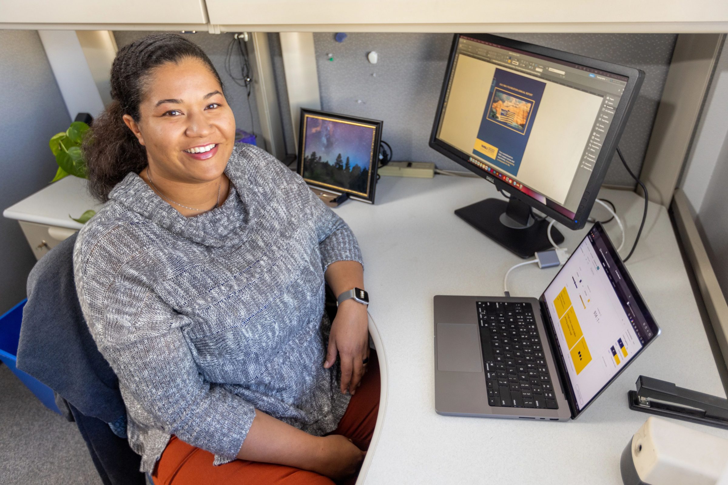 NAU graphic designer Charlese Bedford working on web accessibility.