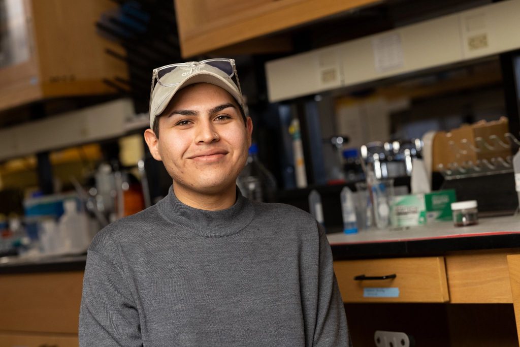 Undergraduate researcher Andres Huerta in the lab.