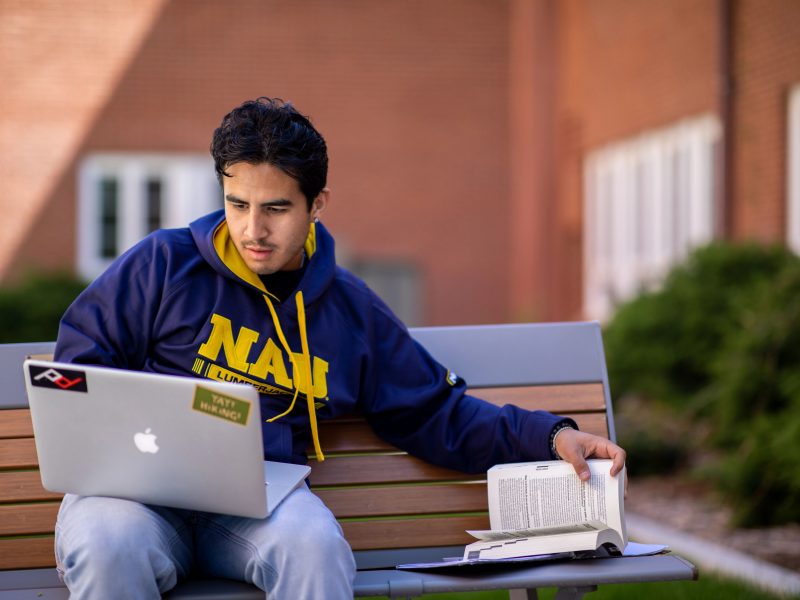 NAU student on laptop
