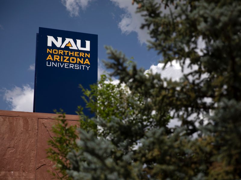 Official logo on an outside sign at NAU