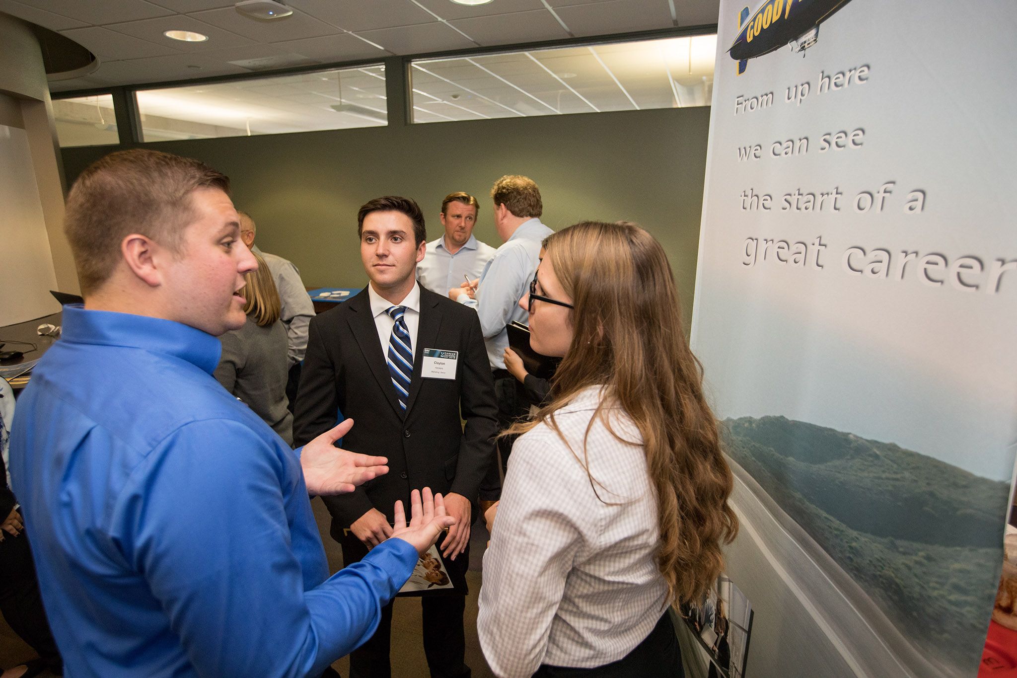 Students and employers participating in a career fair.
