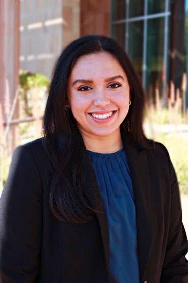 Northern Arizona University sophomore, Lenora Argomaniz, smiles and poses for a portrait.