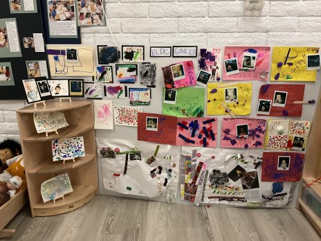 Collage of art made by children, displayed in a classroom "ELDC gallery"