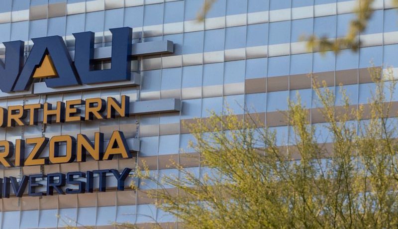A large building with the NAU logo.
