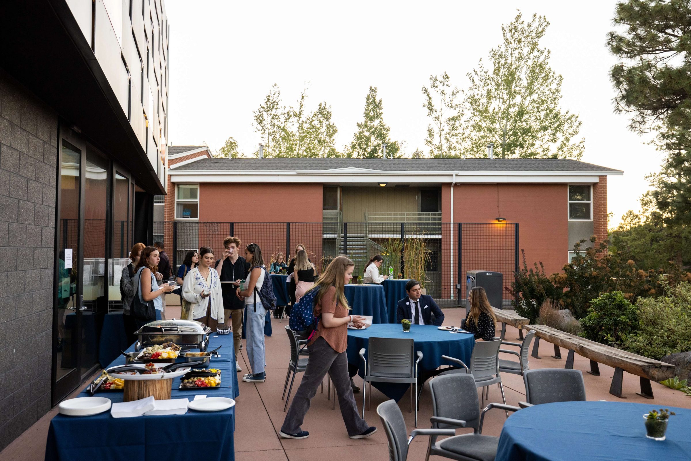 N A U students celebrate on the International Pavilion patio area.