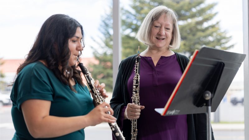 Student and instructor with Oboes in an audition setting