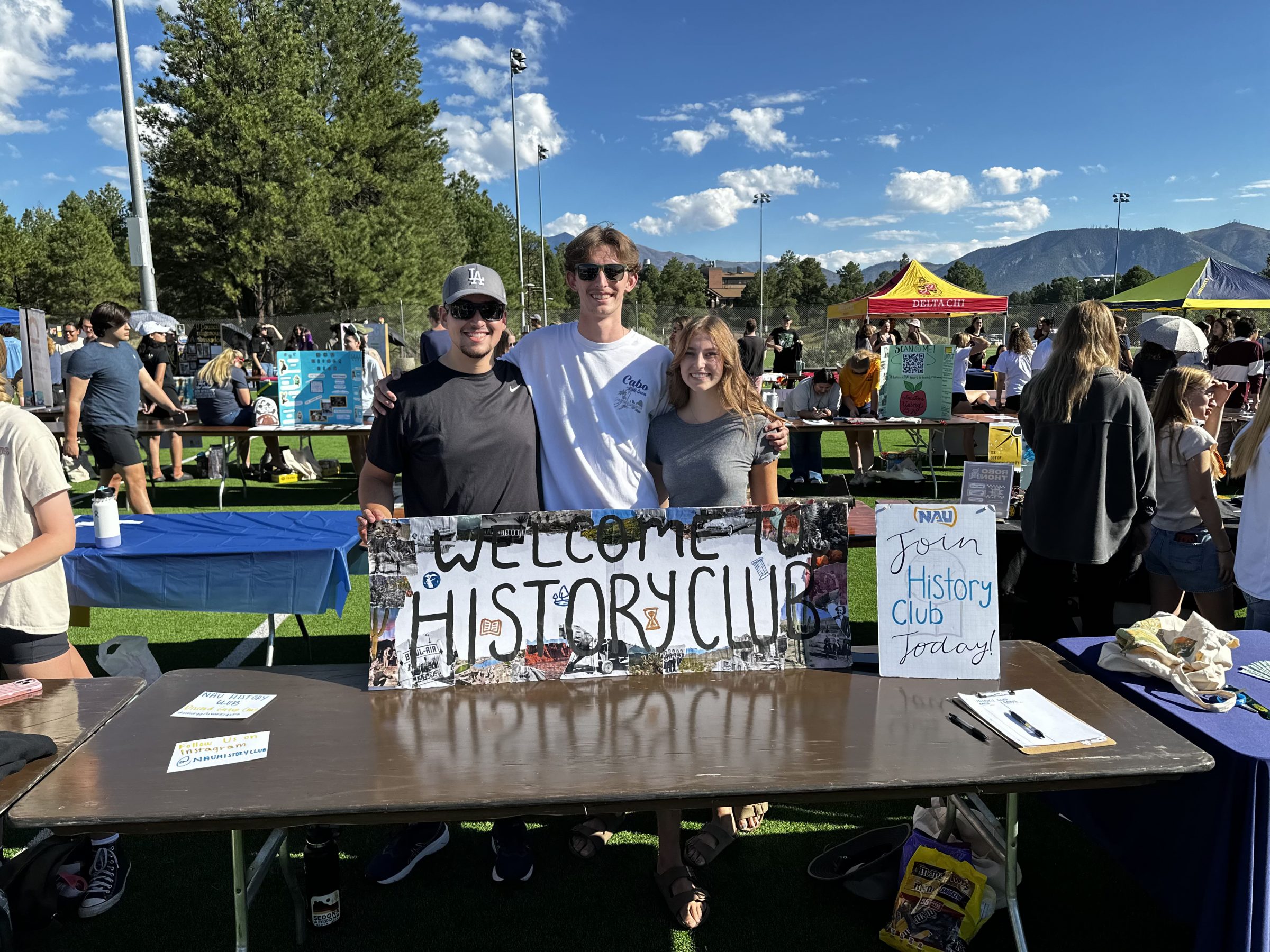 Students at club fair with history club table