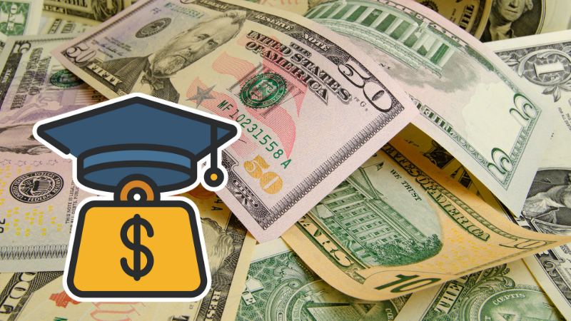 Cash scattered in a pile behind an anvil with a dollar sign on it wearing a graduation cap.