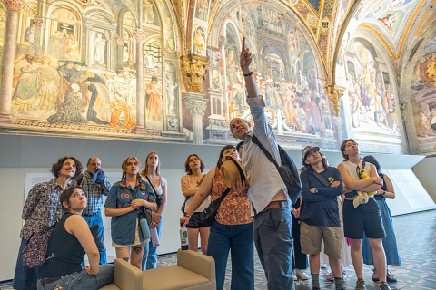 Group of N A U students looking at art in Tuscany, Italy.