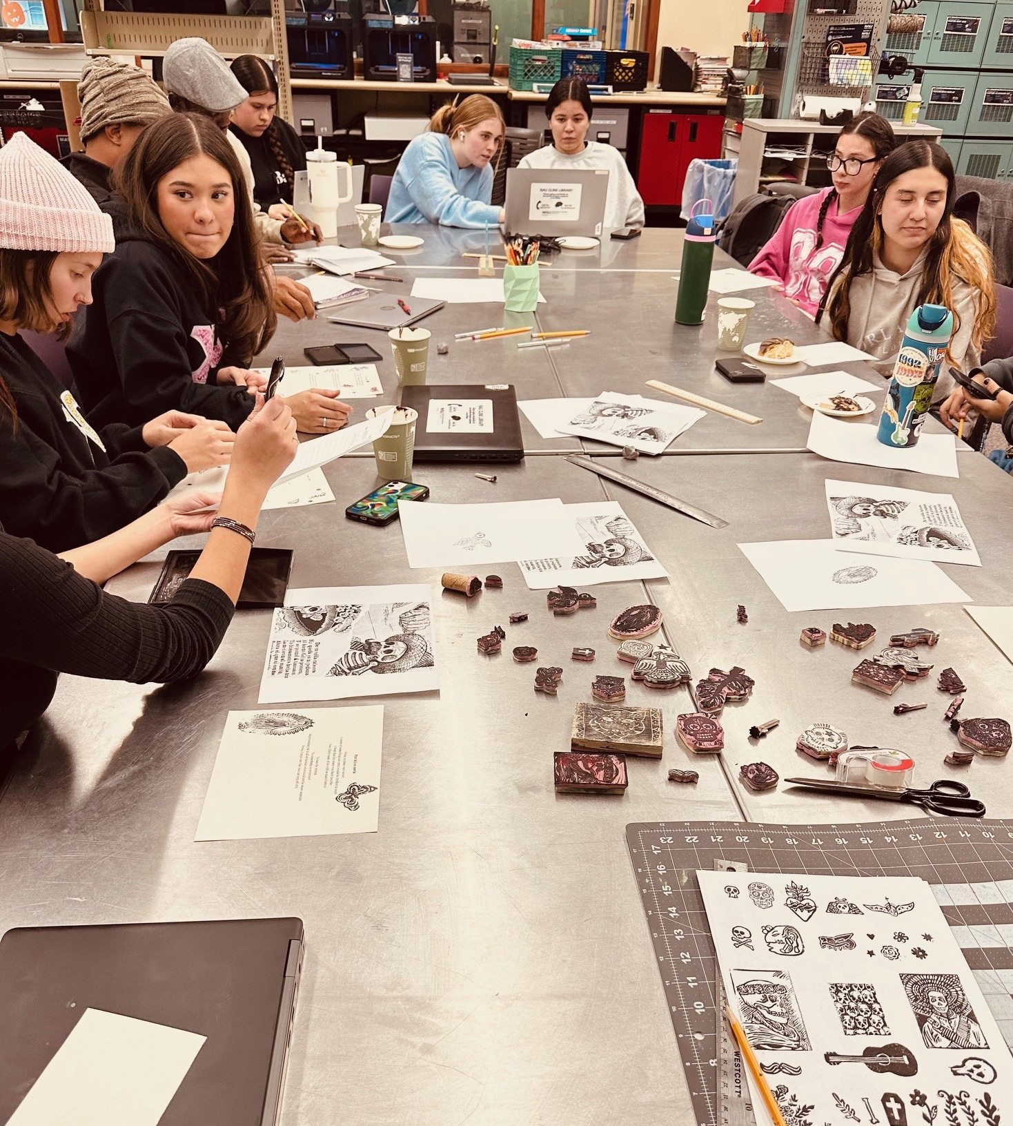 A group of people sitting at a table.