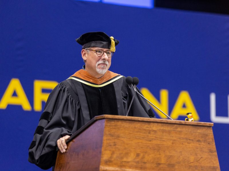 Male speaker at the podium during commencement