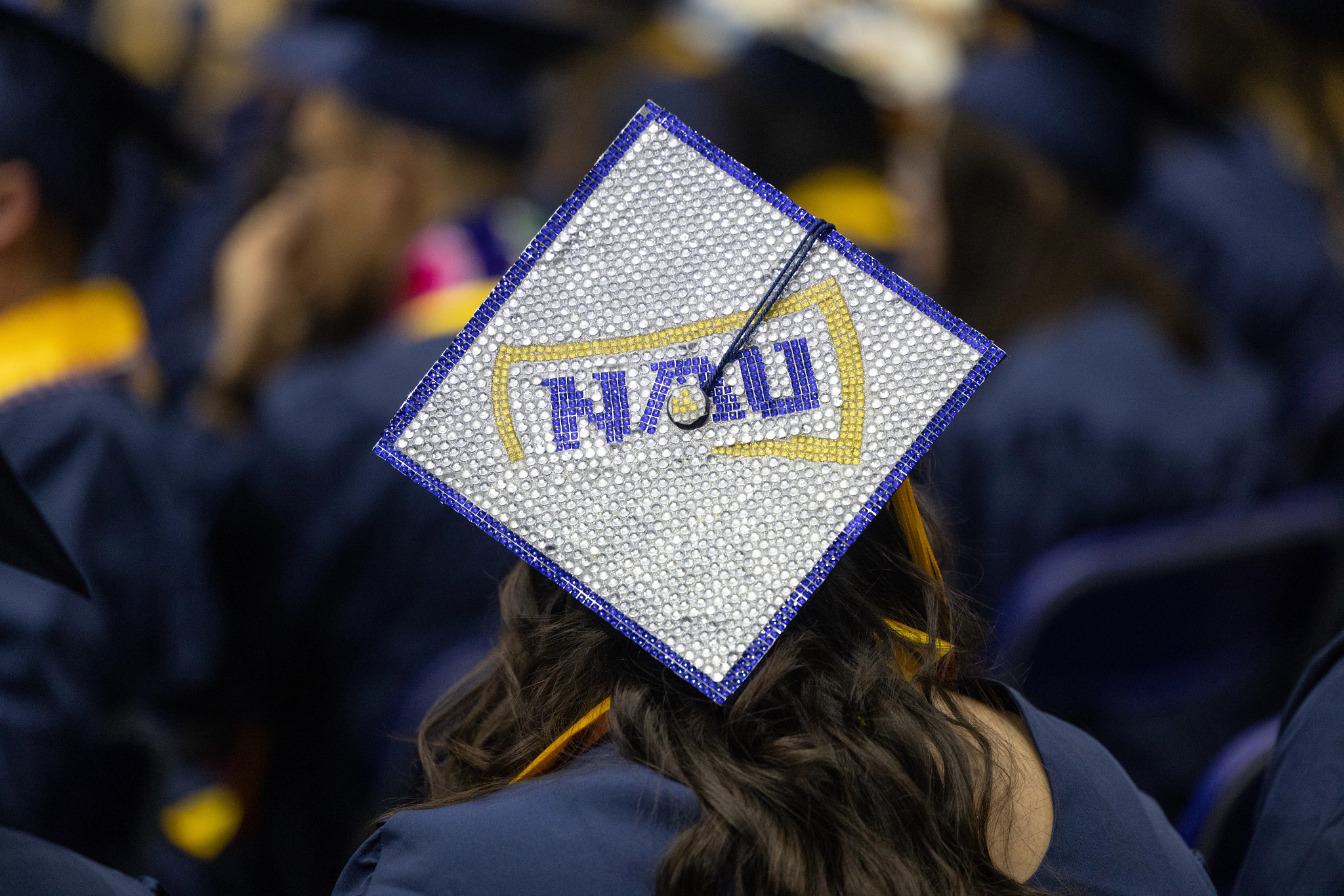NAU graduation cap.