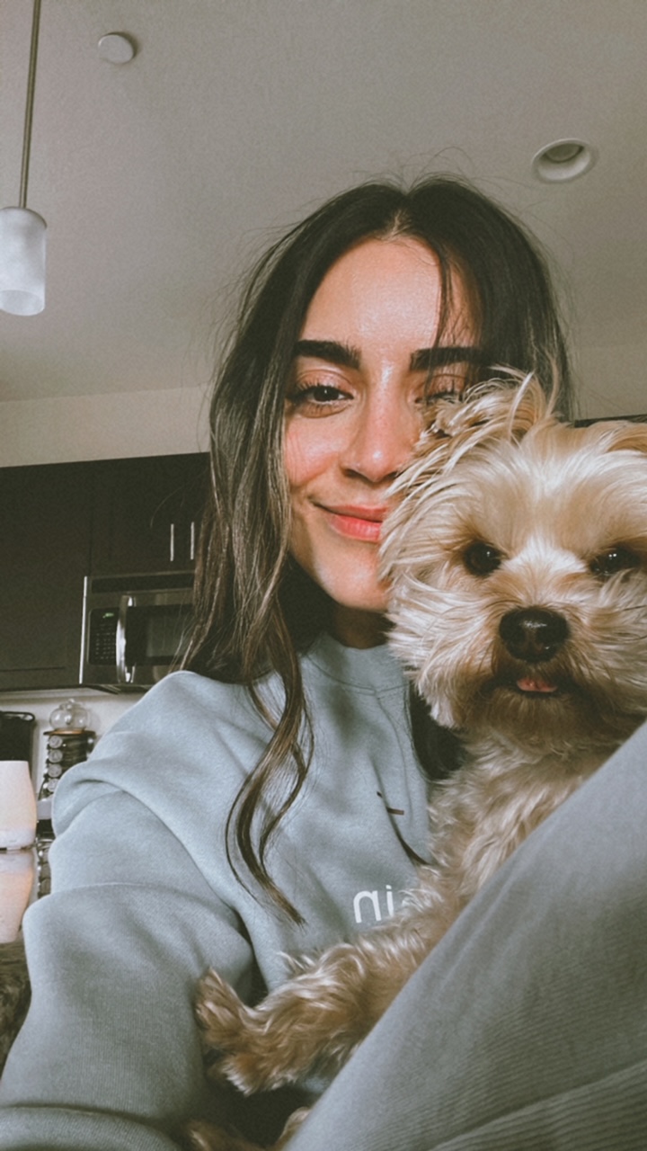 N A U Occupational Therapy student, Sepideh (Sepi) Almasi, takes a selfie with her dog.