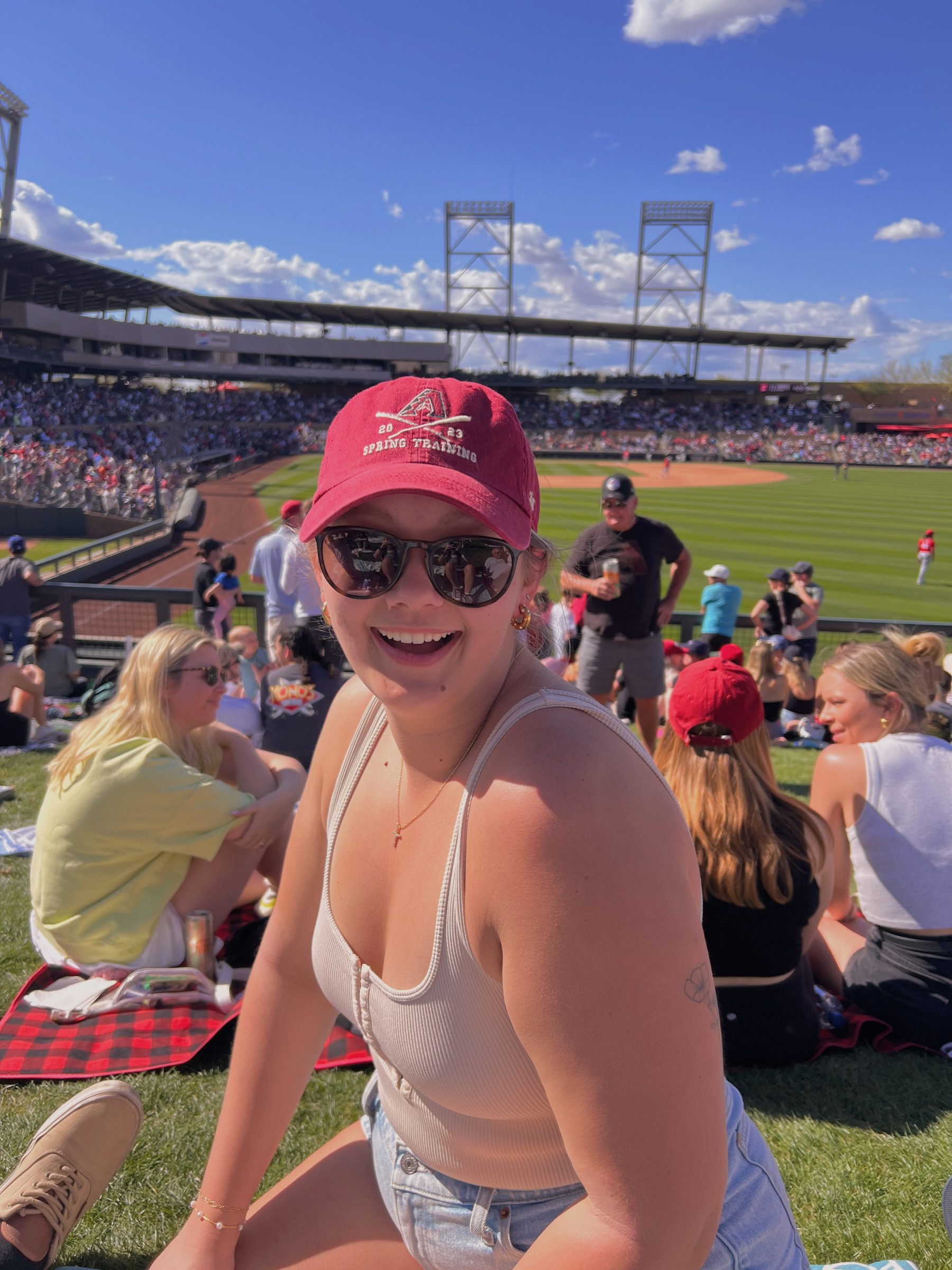 Haley Alexander, Doctor of Physical Therapy student at NAU, on a baseball field.