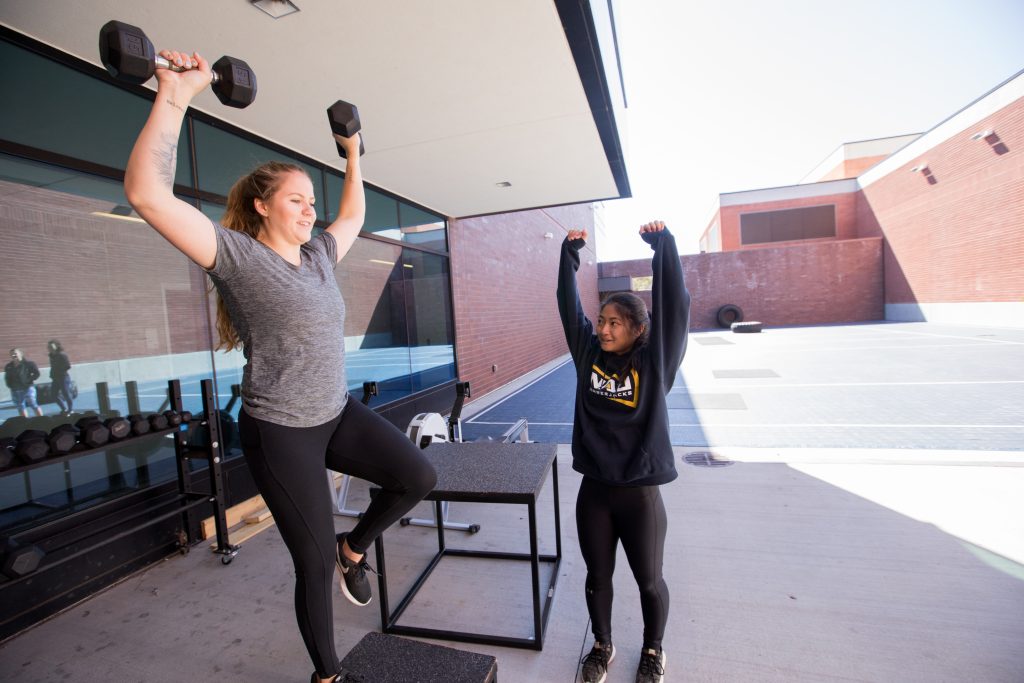 Macyn Helmsing demonstrating an exercise in the Fitness Wellness program.