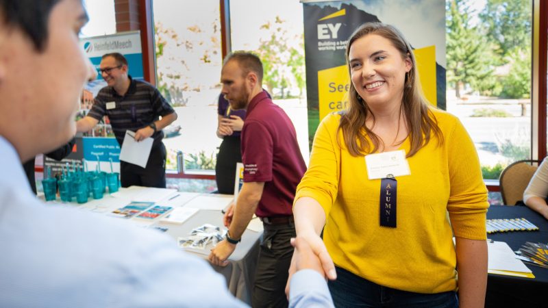 Student and employer networking at an event