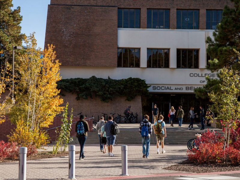 Students walking to class in SBS Castro building