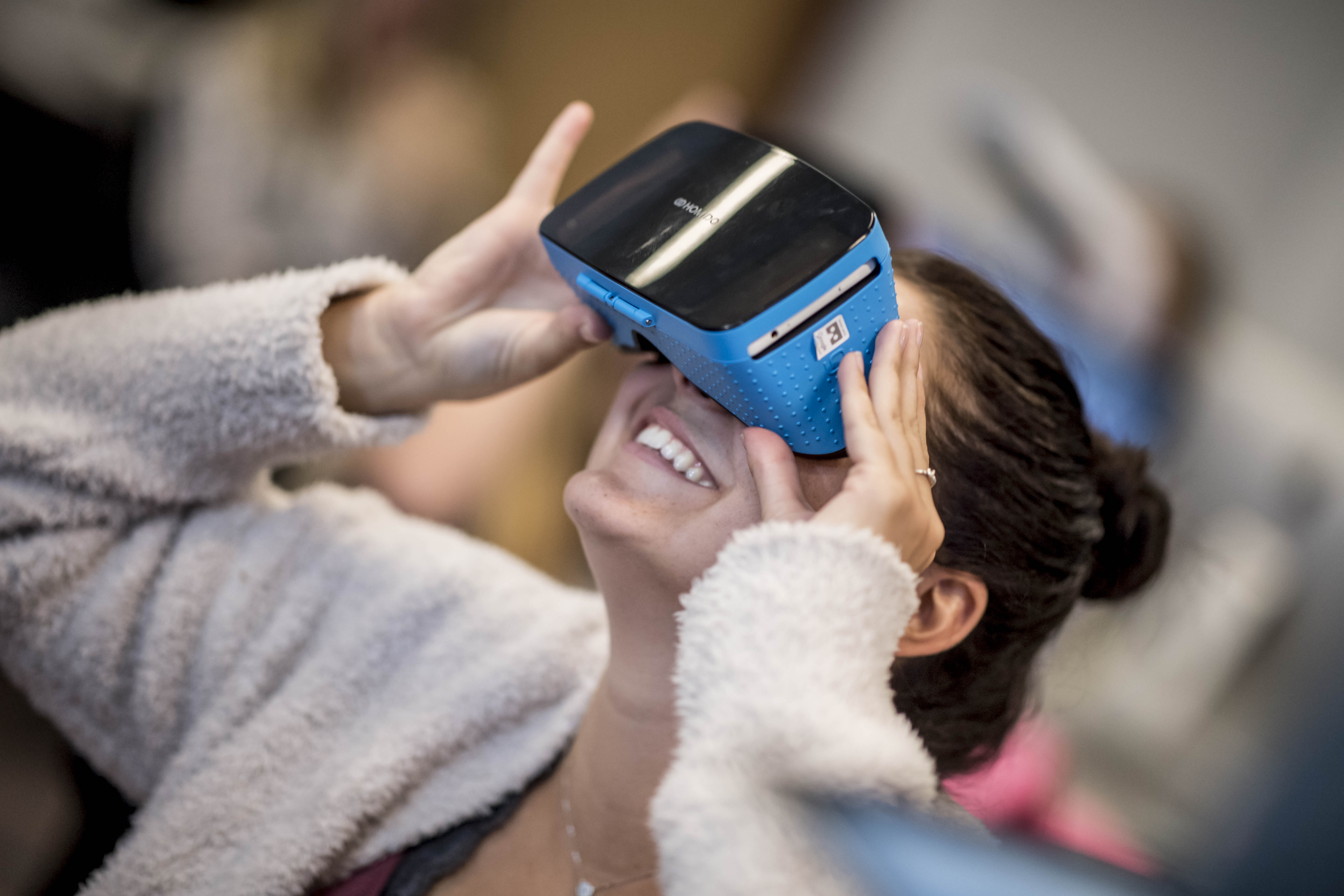 N A U student looks into VR goggles.