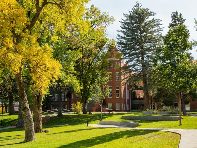 Picture of old main in the fall.