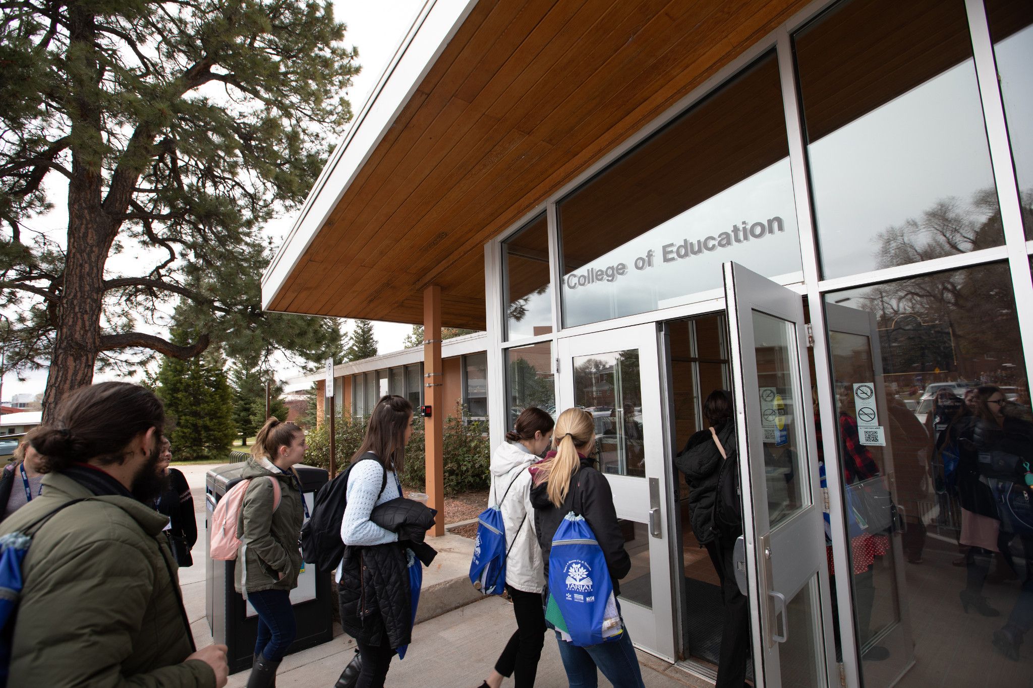 People entering the College of Education building.