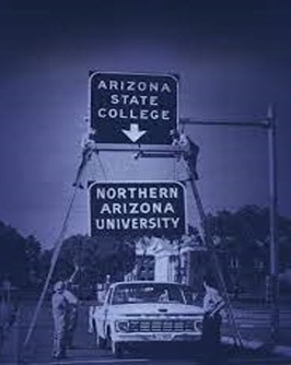 Changing the road signs from Arizona State College to Northern Arizona University in 1966