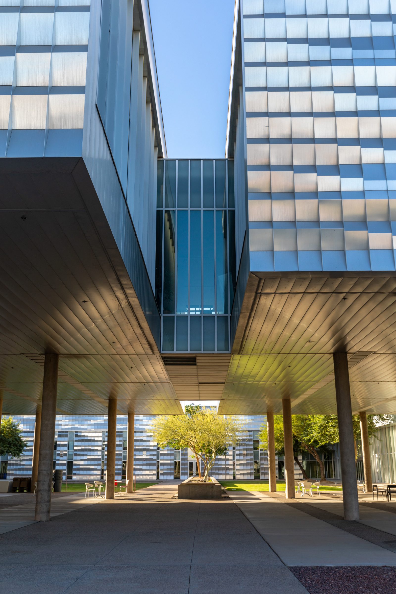 The sun shine and reflects off the silver Yuma building.