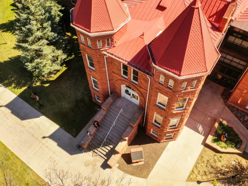 A photo taken by a drone of Old Main.