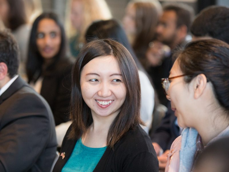 A photo of international students smiling and talking to each other at an International celebration.