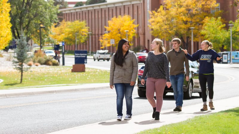 A photo of students walking on campus.
