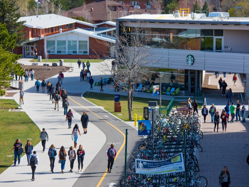 Students walk by the University Union on N A U Flagstaff campus.