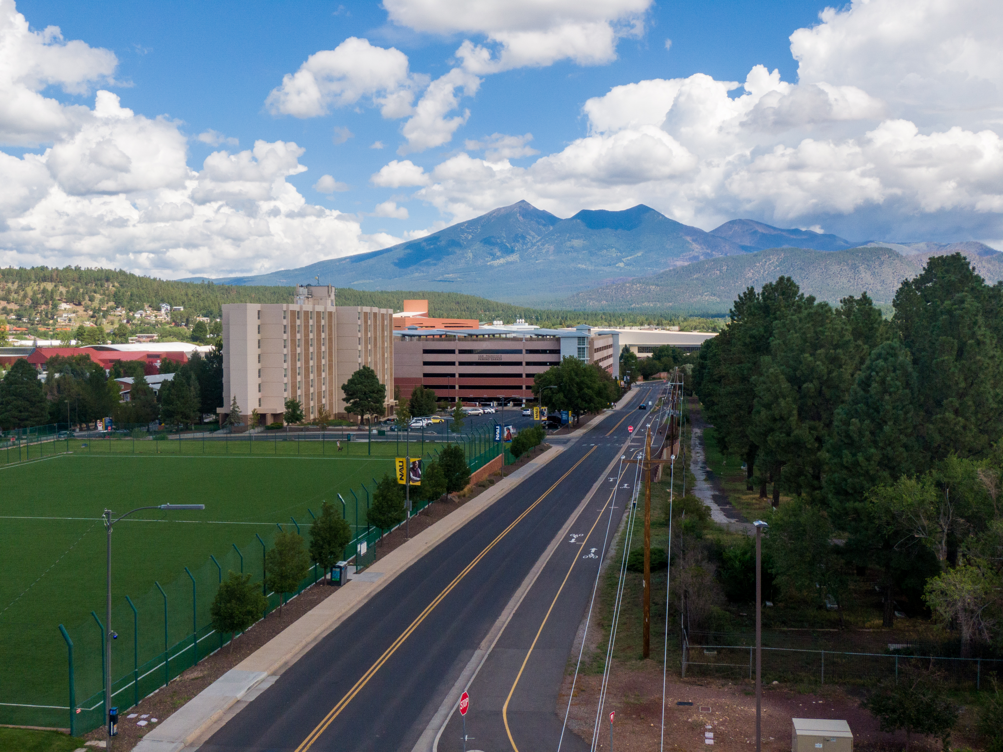 An image of the N A U campus and mountains in Flagstaff, Arizona