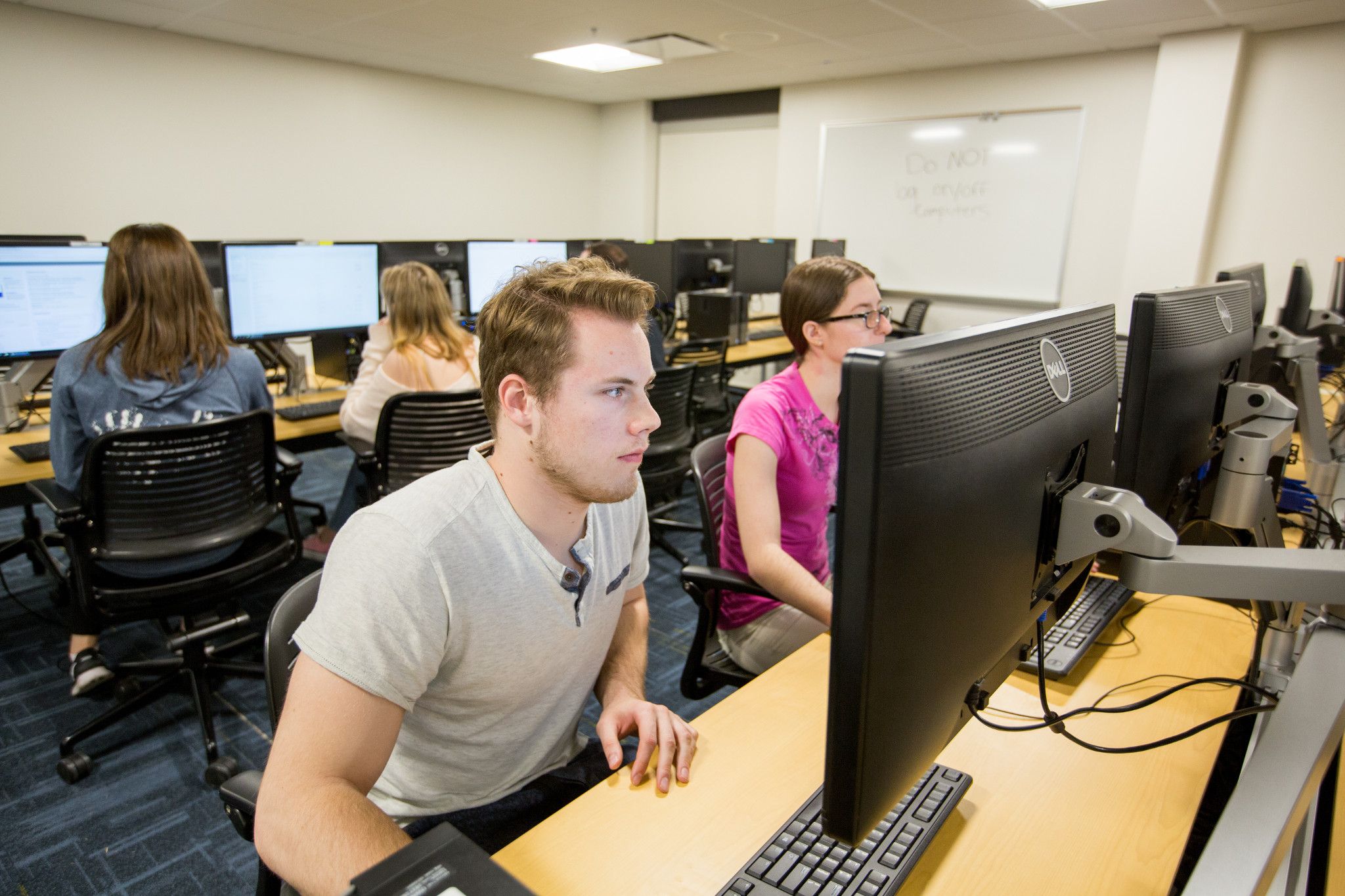 Students using computers in a computer lab in the Academic Success Center.