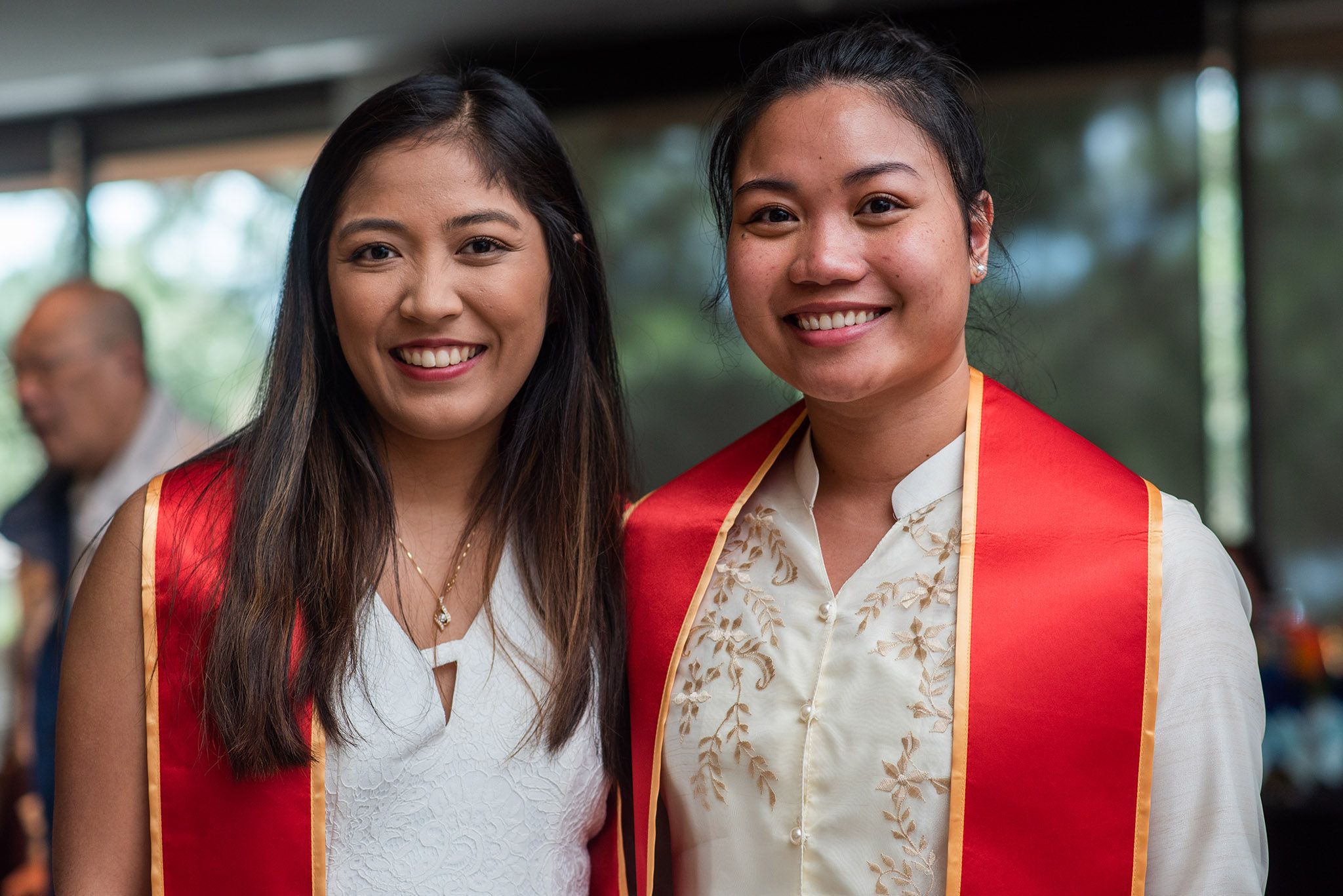 Two students at the Asian Pacific Islander convocation.