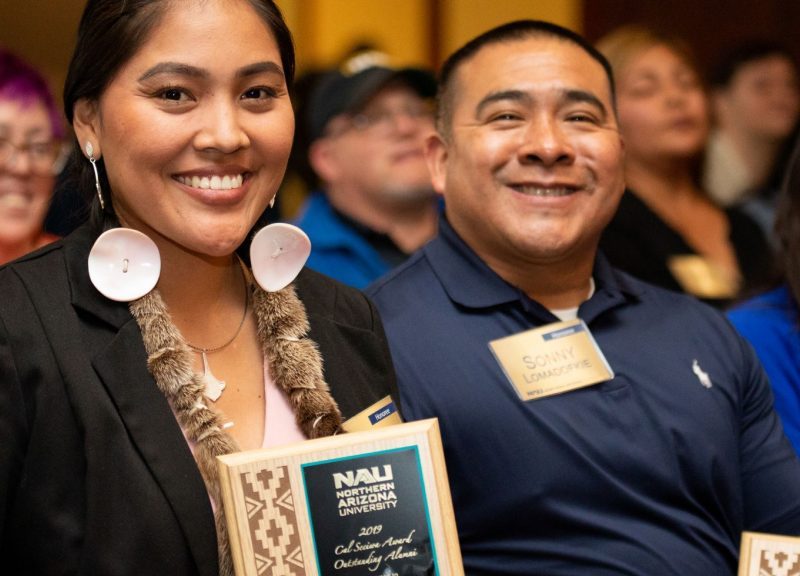 A 2019 Diversity and Equity award winner smiling for a photo